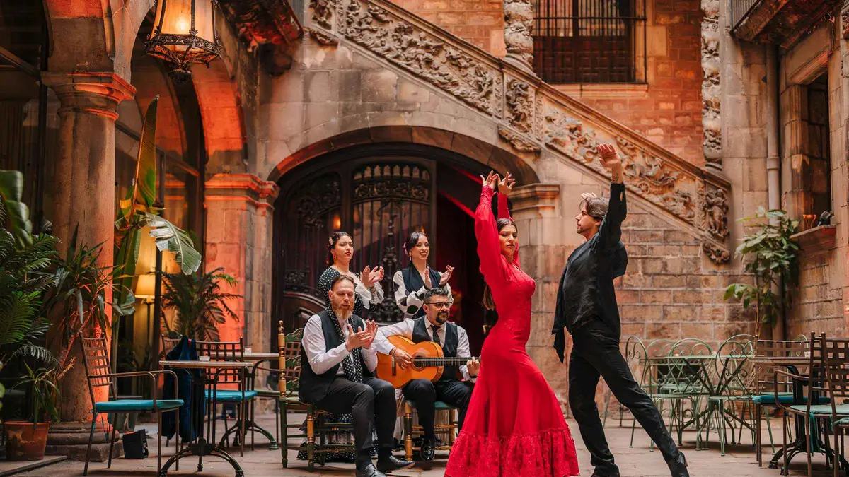 Flamenco dancer performing in the Baroque salon of Palau Dalmases at a flamenco show in Barcelona, Spain